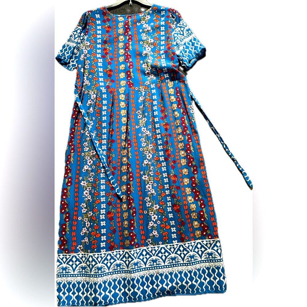 Floral patterns with wavy lines belt will make the edgy feminine appearance. NWT